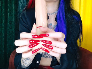 Red sharp long nails. Nail fetish shows on dildo.