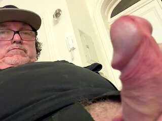 Daddy's penis displayed being stroked.