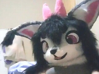 Curvy girl in furry suit gets herself off with a huge toy