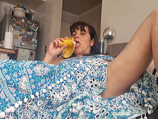 Stepmom in Armchair Touching Her Pussy