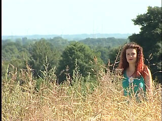 Busty redhead teen lifting dress outdoors