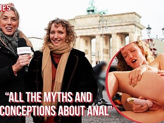 A hot blonde fingers her friend's ass after a street interview turns lesbian