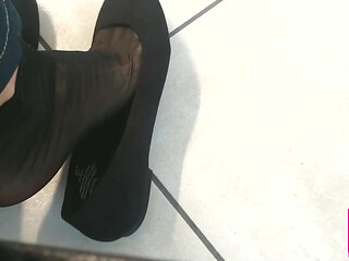 Dangling in Black Flats and Black Nylon Socks