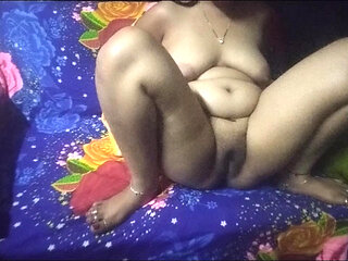 Sister-in-law is sitting on the couch showing her pussy.