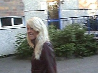Solo blonde babe masturbates in public with boots on