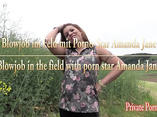 Dirty blonde porn star Amanda Jane gives a hot blowjob in the countryside