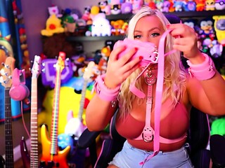 A super sexy blonde with big boobs and masturbating with a v