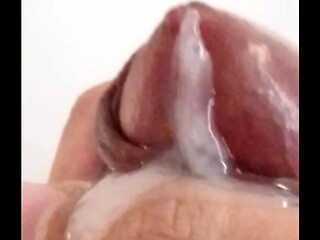 Jacking off my uncircumcised cock, cumming, extreme closeup. July 7, 2024.
