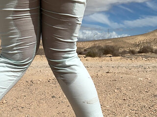 Girl can't hold pee and wet her pants on the public road