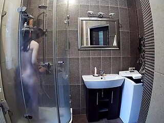 Skinny brunette Stella shows off in the shower