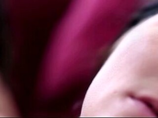 Lesbian women kiss and finger each other hornyly.
