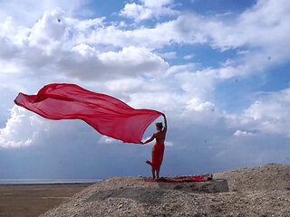 On Top of Hill with Red Flag