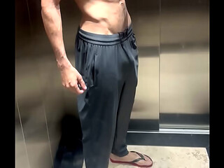 Walking on the beach trail in shorts without underwear, showing off his huge dick.