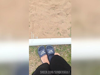 Bare feet playing in the sand Sensory purposes