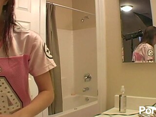 Young, sexy brunette dolling up for action