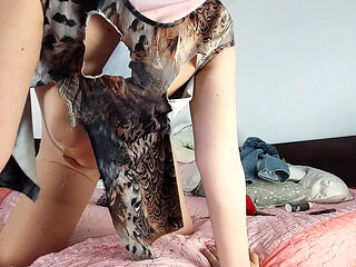 Amateur wife has fun trying on clothes that she tears.