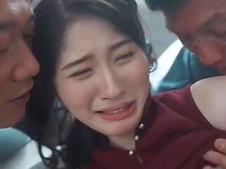 My beloved wife is sandwiched between me and him, like a skewer with no way to escape.