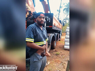 Worker Masturbating at the Construction Site Hidden Behind the Company Truck