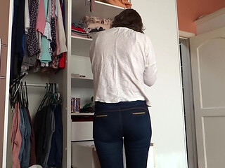After Urinating, the Stepmother Puts on Very Tight Jeans, Revealing Her Panties