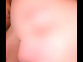 Sexy redhead gives intimate beachside blowjob
