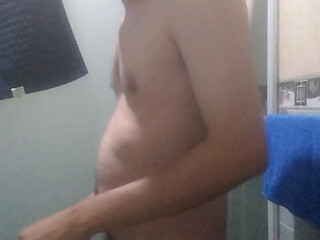Man has fun before shower