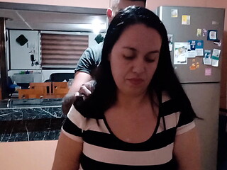Hot stepmom has sex with her stepson in the kitchen of the house