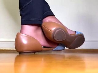 MILF Plays with Her Flats on Her Feet