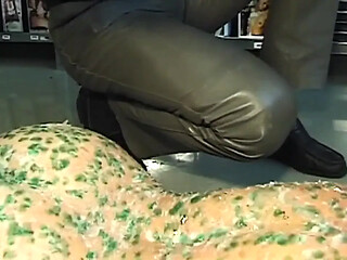 Mature redhead MILF gets a sound spanking while naked and exposed.