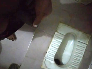 Desi man peeing and jarking