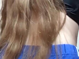 Longhaired redhead tease in gym clothes