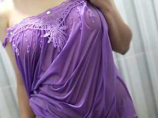 AMATEUR BUSTY GIRL IN A TRANSPARENT DRESS