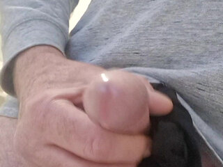 Wanking my cock with a pair of my girlfriends knickers tied around my shaft. Big cum shots