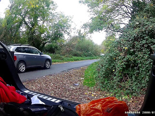 Just getting changed parked at side of road with cars driving past