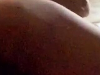 Pink labia close up of naive brunette playing with her name