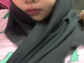 Hijabi malay sucking dildo