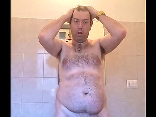 Naked boy in bathroom