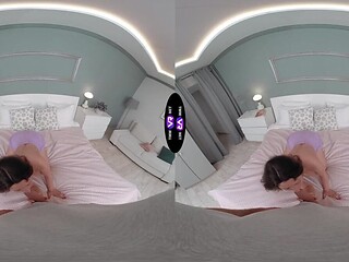 Dark-haired beauty rides backward on VR cock