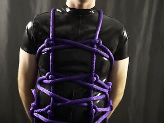 Rubber gimp tied up and ready to serve