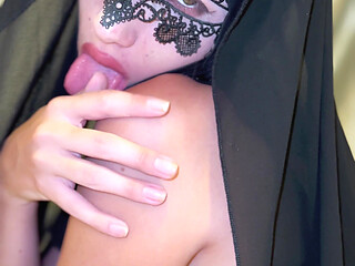 Seductive Black Hijab Girl in Lace Mask on Knees