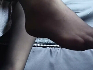 Putting on my black thigh high nylon stockings