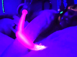 Blacklight goth girl with neon hair edges big dick with crazy massage gun toy gets huge cumshot