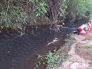 Unexpectedly, two strangers meet at the creek for a steamy encounter