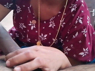 The wife puts her husband's penis in her mouth and gives him a good blowjob, and they both enjoy it.