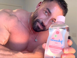 Sexy Muscle God Flexes and Oils Up