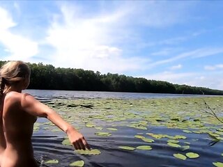 Naked Blonde Swimmer in the Lake
