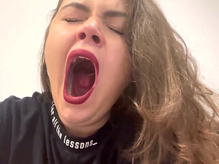 Yawning with red lipstick
