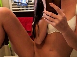 Cute brunette amateur teen masturbates on webcam