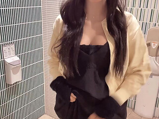 Video of a cross-dresser quietly masturbating in a public restroom