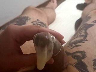 Jerking off and Cum in a Condom