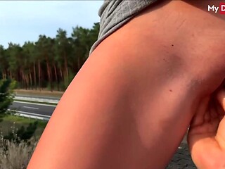 German MILF gets her tight pussy deeply fist-fucked in public